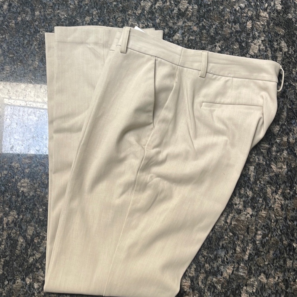 Work pants Express,the side there is some stitching missing shows in the picture